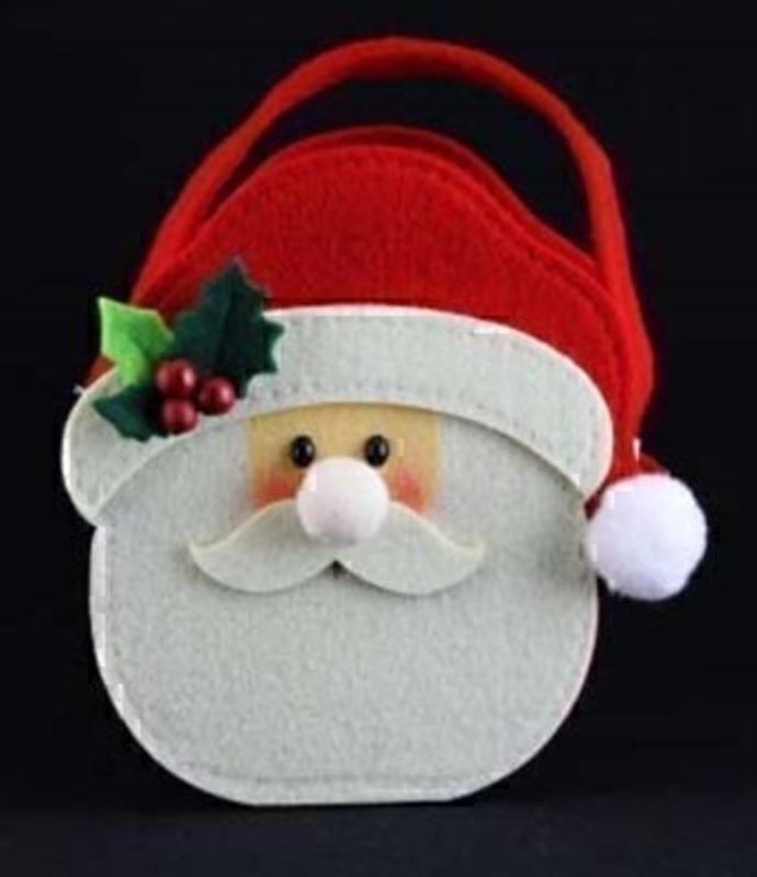 Felt Santa Father Christmas Bag by Gisela Graham. Head of Father Christmas in a bag shape makes a great gift bag. Size 16x15.5x10cm This jolly felt gift bag will be great for wrapping Christmas presents and will be able to be used year after year complimenting your Christmas Decorations<br><br>
If it is Christmas Decorations to be sent anywhere in the UK you are after than look no further than Booker Flowers and Gifts Liverpool UK. Our Christmas Decorations are specially selected from across a range of suppliers. This way we can bring you the very best of what is available in Christmas Decorations.<br><br>
Gisela loves Christmas Gisela Graham Limited is one of Europes leading giftware design companies. Gisela made her name designing exquisite Christmas and Easter decorations. However she has now turned her creative design skills to designing pretty things for your kitchen, home and garden. She has a massive range of over 4500 products of which Gisela is personally involved in the design and selection of. In their own words Gisela Graham Limited are about marking special occasions and celebrations. Such as Christmas, Easter, Halloween, birthday, Mothers Day, Fathers Day, Valentines Day, Weddings Christenings, Parties, New Babies. All those occasions which make life special are beautifully celebrated by Gisela Graham Limited.<br><br>
Christmas and it is her love of this occasion which made her company Gisela Graham Limited come to fruition. Every year she introduces completely new Christmas Collections with Unique Christmas decorations. Gisela Grahams Christmas ranges appeal to all ages and pockets.<br><br>
Gisela Graham Christmas Decorations are second not none a really large collection of very beautiful items she is especially famous for her Fairies and Nativity. If it is really beautiful and charming Christmas Decorations you are looking for think no further than Gisela Graham.<br><br>
This jolly Santa Father Christmas bag by Gisela Graham will compliment your Christmas Decorations.  Coming out year after year he will bring a smile to your face and bringing Christmas cheer and festive spirit to the house fitting in with many Christmas Themes. For Gisela Graham Christmas Decorations sent anywhere in the UK remember Booker Flowers and Gifts in Liverpool UK
